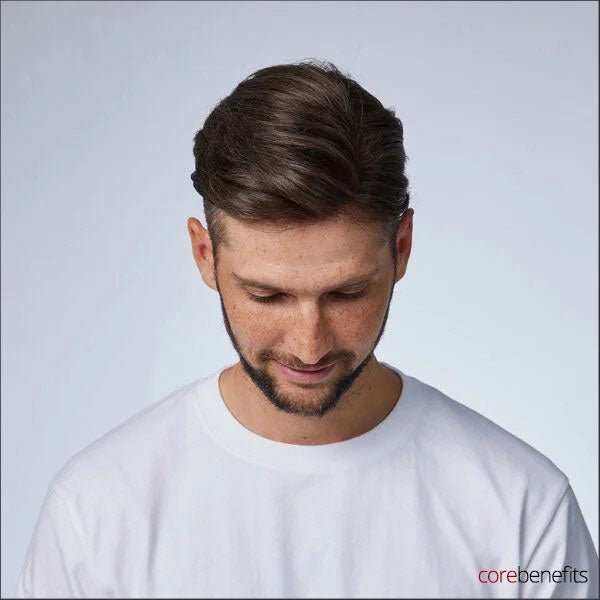 Close-up of the top view of The Dominator Hair System, a men's hair piece by Core Benefits Toowoomba, showcasing the ultra-thin 0.06mm poly skin for a natural and realistic look in men's toupees and wigs.