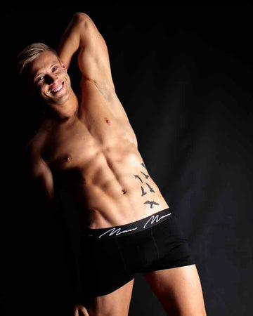 Joyful Vitality: Male Model Celebrating Fitness and Style - Core Benefits Toowoomba